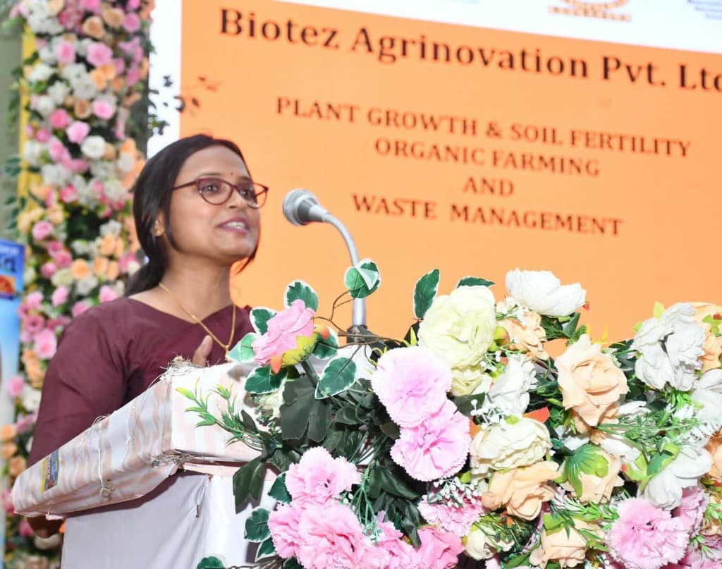 Speaker at the National Agricultural Policy seminar podium with Biotez Agrinovation backdrop, Sambalpur